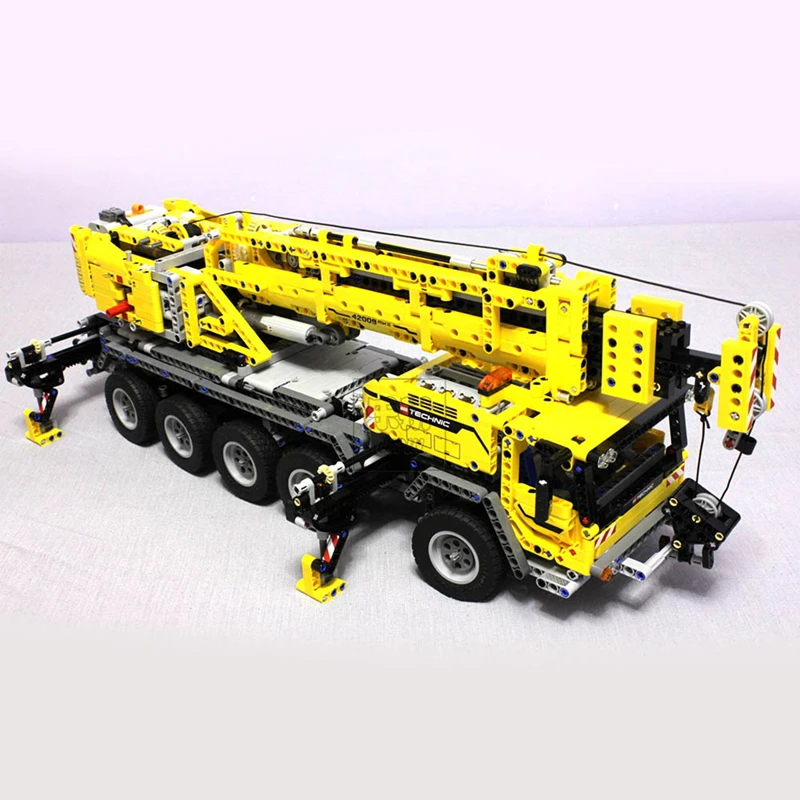 20004 Technic series Motor Power Mobile Crane Mk II Car Model Building Kits Blocks Bricks Compatible With 42009 gifts 90004
20004 Technic series Motor Power Mobile Crane Mk II Car Model Building Kits Blocks Bricks Compatible With 42009 gifts 90004