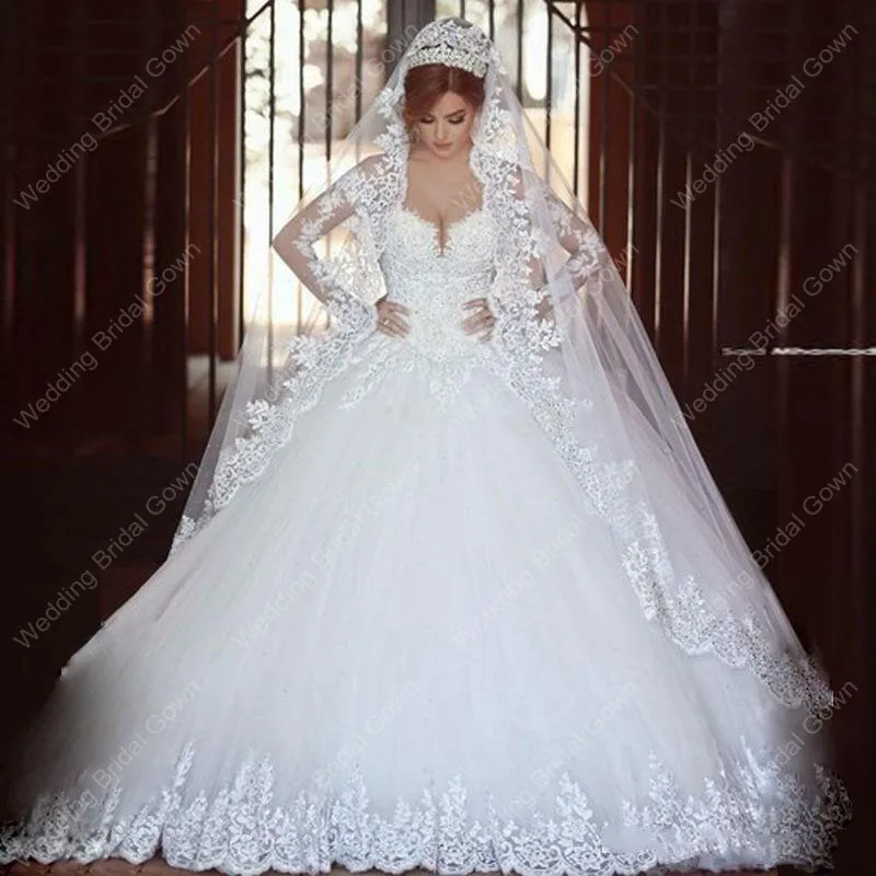 White Tulle Ball Wedding Dresses Illusion Long Sleeves Off Shoulder Lace Appliques Train Bridal Gowns Vestidos
White Tulle Ball Wedding Dresses Illusion Long Sleeves Off Shoulder Lace Appliques Train Bridal Gowns Vestidos