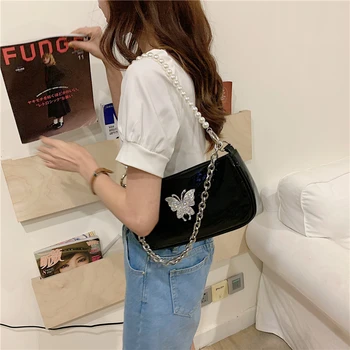 Women's 2020 new one-shoulder handbag studded with diamonds butterfly underarm bag pearl chain simple bag 
Women's 2020 new one-shoulder handbag studded with diamonds butterfly underarm bag pearl chain simple bag