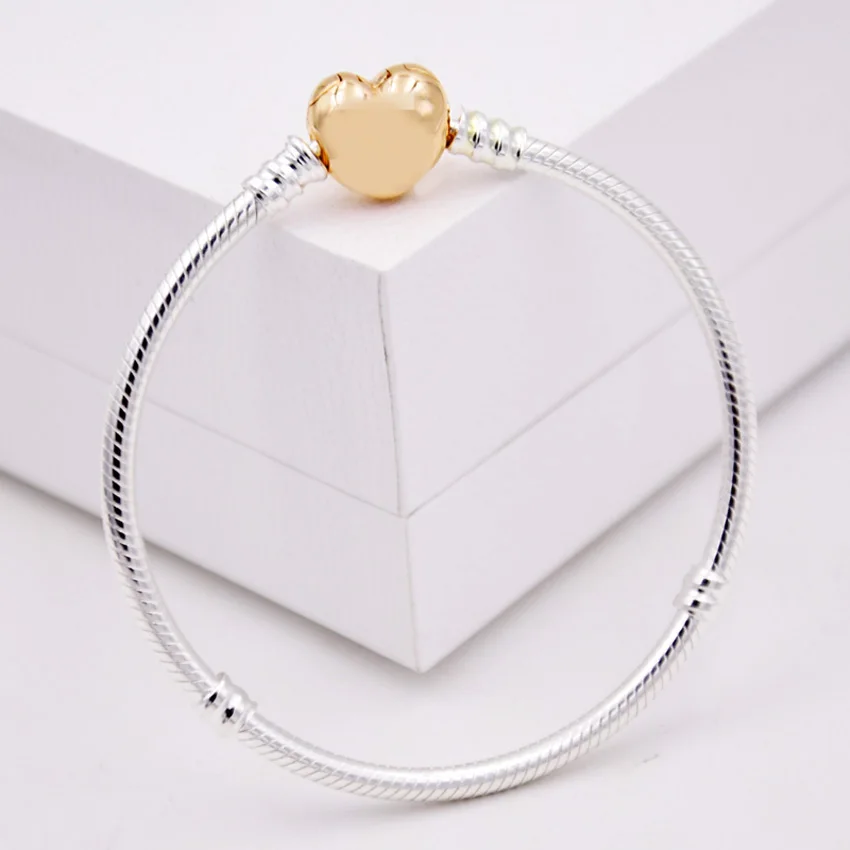 Authenetic 925 Sterling Silver Bracelet Gold Color Love Heart Clasp Snake Chain Bracelet Bangle Fit Women Bead Charm DIY Jewelry
Authenetic 925 Sterling Silver Bracelet Gold Color Love Heart Clasp Snake Chain Bracelet Bangle Fit Women Bead Charm DIY Jewelry