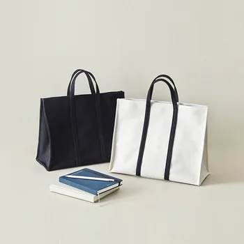 Canvas bag ladies handbag new Korean version of the simple style female bag fashion atmosphere hand bag wholesale
Canvas bag ladies handbag new Korean version of the simple style female bag fashion atmosphere hand bag wholesale