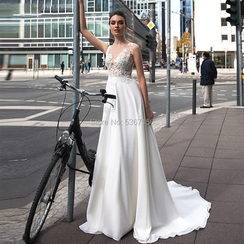 Princess Wedding Dresses 2020 A line Appliqued Lace Bridal Gowns Vestido De Noiva Button Illusion Back Wedding Gowns For Women
Princess Wedding Dresses 2020 A line Appliqued Lace Bridal Gowns Vestido De Noiva Button Illusion Back Wedding Gowns For Women