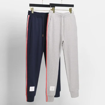 2020 Fashion TB THOM Brand Sweatpants Men Women Slim Cotton Casual Stripe Sports Trousers Tracksuit Bottoms Jogger Track Pants 
2020 Fashion TB THOM Brand Sweatpants Men Women Slim Cotton Casual Stripe Sports Trousers Tracksuit Bottoms Jogger Track Pants