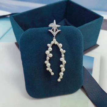One Piece 925 Pearl Dangle Earring With Cubic Zirconia Star New Moon Hollow Flower Design for Women Trendy ENED Jewelry 
One Piece 925 Pearl Dangle Earring With Cubic Zirconia Star New Moon Hollow Flower Design for Women Trendy ENED Jewelry