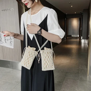 Hand Woven Pearl Shoulder Bag Women Elegant Mini Crossbody Messenger Handbag Phone Pouch With Drawstring Pocket
Hand Woven Pearl Shoulder Bag Women Elegant Mini Crossbody Messenger Handbag Phone Pouch With Drawstring Pocket
