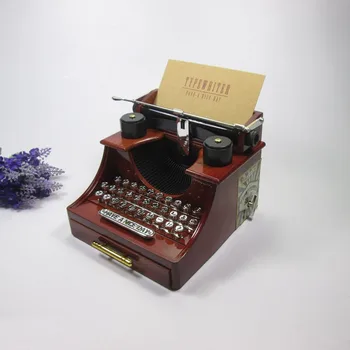 Typewriter music box Creative dynamic winding music box music jewelry box
Typewriter music box Creative dynamic winding music box music jewelry box