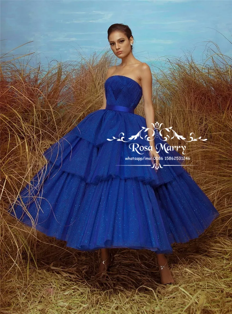 Sparkly Royal Blue Sequined Prom Dresses 2020 Ball Gown Strapless Plus Size Tea Length Cheap Arabic African Formal Evening Gowns
Sparkly Royal Blue Sequined Prom Dresses 2020 Ball Gown Strapless Plus Size Tea Length Cheap Arabic African Formal Evening Gowns
