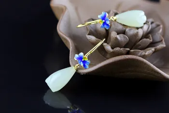 S925 silver jewelry lady Shaolan folk style orchid natural Hetian Earrings
S925 silver jewelry lady Shaolan folk style orchid natural Hetian Earrings