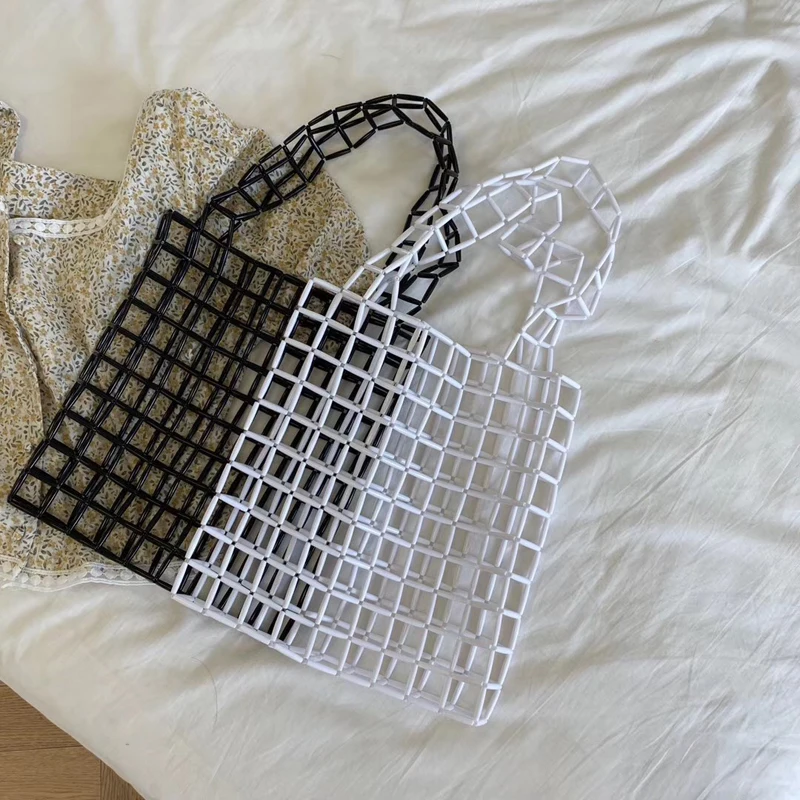 2020 Summer New Women Small Bead Handbags Knitting Acrylic Tote Bag Designer Korean Style Hollow Out Ladies Shoulder Bag Beach
2020 Summer New Women Small Bead Handbags Knitting Acrylic Tote Bag Designer Korean Style Hollow Out Ladies Shoulder Bag Beach