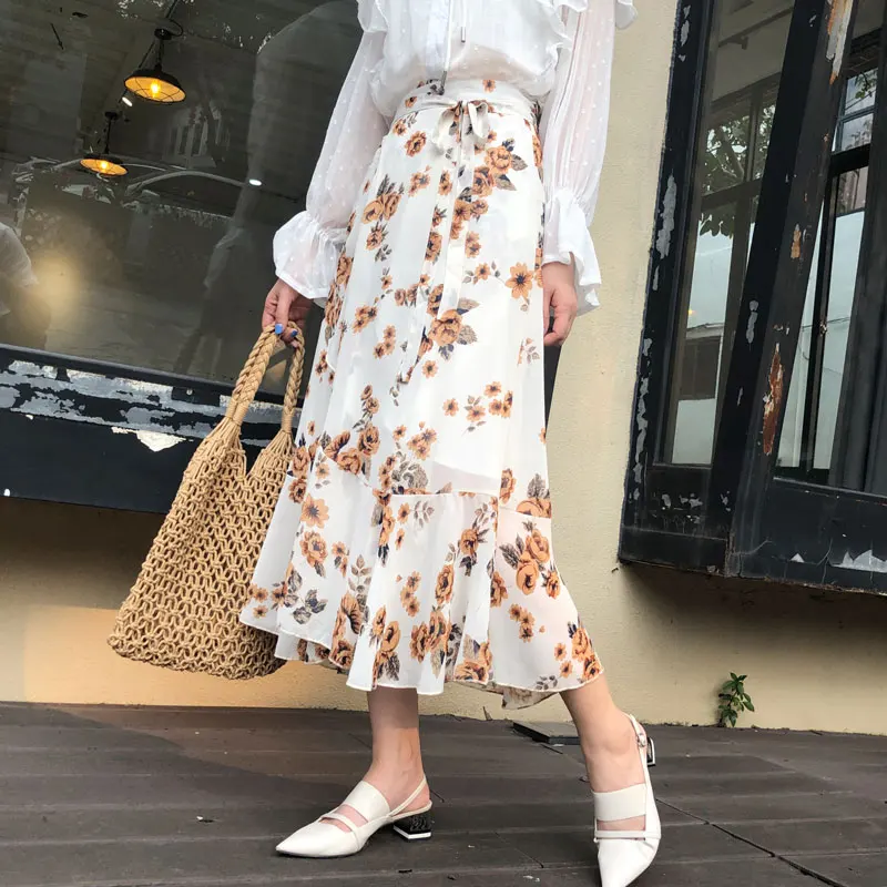 VICONE summer of tall waist long irregular with chiffon skirts female a chip over-the-knee broken flower skirt
VICONE summer of tall waist long irregular with chiffon skirts female a chip over-the-knee broken flower skirt
