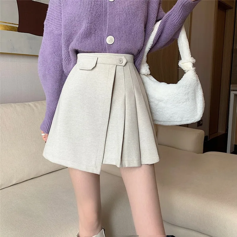 Autumn and winter woolen skirt, female design sense, high waist pleated skirt, hip a-line skirt
Autumn and winter woolen skirt, female design sense, high waist pleated skirt, hip a-line skirt