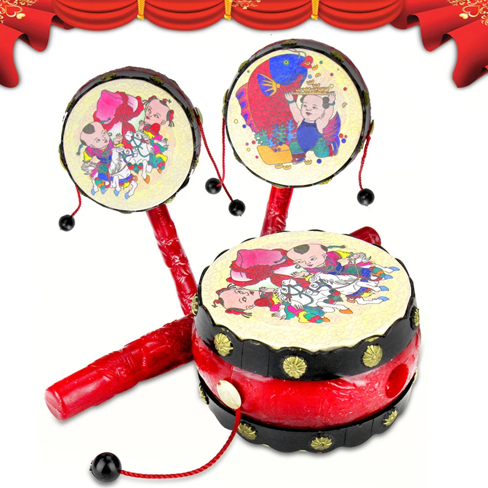 Chinese traditional New Year hand rattle tambourine rotating baby toys appease hand drum music toy
Chinese traditional New Year hand rattle tambourine rotating baby toys appease hand drum music toy