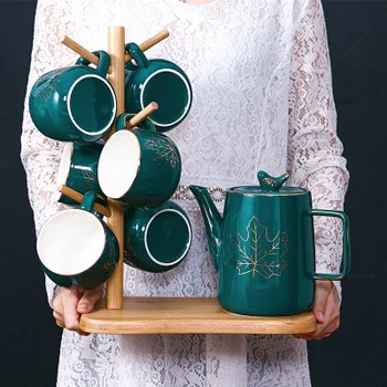 Ceramic Coffee Tea Set Nordic Green White Drawing Gold Elk Coffee Pot Cup Tray Wooden Cup Holder Set Home Afternoon Tea Set 
Ceramic Coffee Tea Set Nordic Green White Drawing Gold Elk Coffee Pot Cup Tray Wooden Cup Holder Set Home Afternoon Tea Set