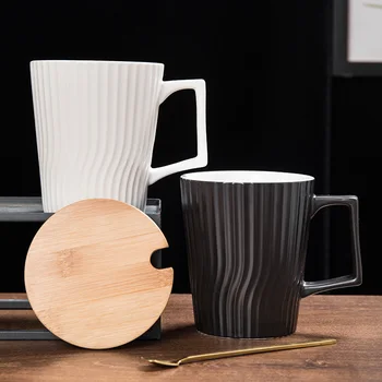 Cup trend ceramic mug with cover spoon coffee water cup household tea cup custom logo for men and women
Cup trend ceramic mug with cover spoon coffee water cup household tea cup custom logo for men and women