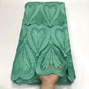 High Quality African Guipure Cord Lace Fabric Latest Nigerian French Network Cord Lace Fabric With Stones For Dress 
High Quality African Guipure Cord Lace Fabric Latest Nigerian French Network Cord Lace Fabric With Stones For Dress