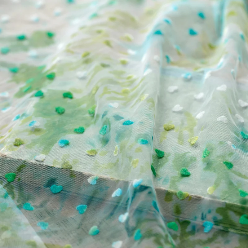 Net yarn fabric gradient color three-dimensional love pattern flocking lace fabric skirt fabric handmade DIY background cloth
Net yarn fabric gradient color three-dimensional love pattern flocking lace fabric skirt fabric handmade DIY background cloth