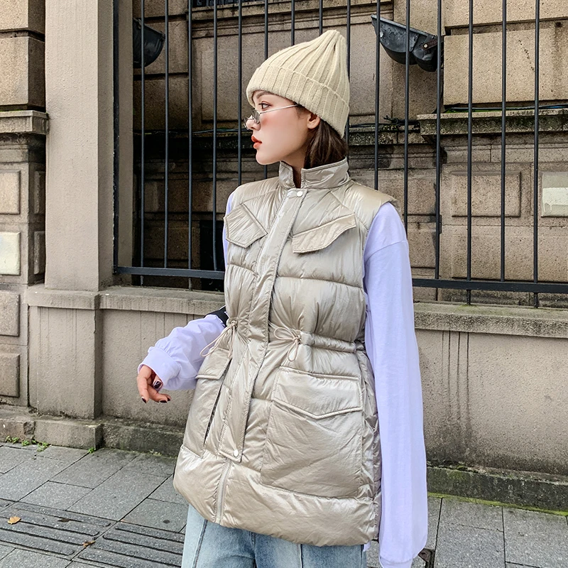 Autumn Winter Women's Solid Loose Vest Drawstring Stand Collar Long Vest Jacket Cotton Padded Warm Women Waistcoat
Autumn Winter Women's Solid Loose Vest Drawstring Stand Collar Long Vest Jacket Cotton Padded Warm Women Waistcoat