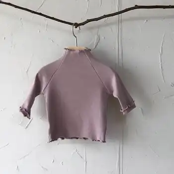 Korean spring and autumn winter infants and young children cotton skin-friendly turtleneck T-shirt boy and girl baby fungus
Korean spring and autumn winter infants and young children cotton skin-friendly turtleneck T-shirt boy and girl baby fungus