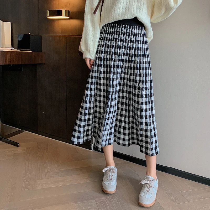 Grid knitted skirts pleated skirt restoring ancient ways to film thickening qiu dong han edition long umbrella skirt of the a-li
Grid knitted skirts pleated skirt restoring ancient ways to film thickening qiu dong han edition long umbrella skirt of the a-li