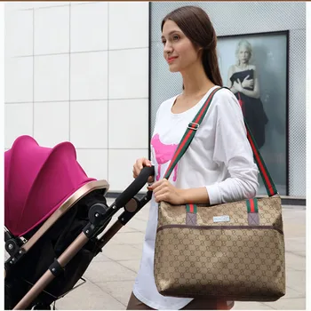 Fashion Brand Mommy Bag Large Capacity Multifunctional Nursing Bag Messenger Bag Mummy Maternity Bag Baby Bags for Mom 
Fashion Brand Mommy Bag Large Capacity Multifunctional Nursing Bag Messenger Bag Mummy Maternity Bag Baby Bags for Mom