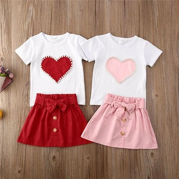 2020 Kid Summer Clothes 1-5T Toddler Kid Baby Girl Pearl Heart-shaped Print T shirt Button Skirt Outfit Clothes 2Pcs Set Sunsuit 
2020 Kid Summer Clothes 1-5T Toddler Kid Baby Girl Pearl Heart-shaped Print T shirt Button Skirt Outfit Clothes 2Pcs Set Sunsuit