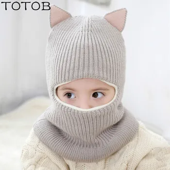 New children's hats autumn and winter men and women outdoor windproof earmuffs one cap double ball knit warm face wool cap
New children's hats autumn and winter men and women outdoor windproof earmuffs one cap double ball knit warm face wool cap