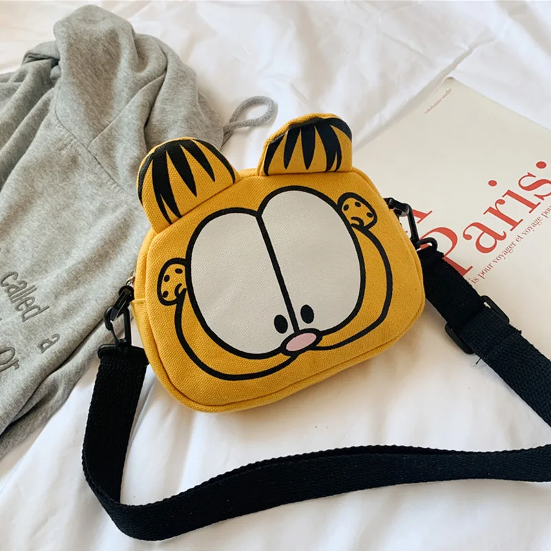 2020 New Korean Children's Bags Crossbody Bag Women's Fashion Cartoon Cat Canvas Bag Men And Women Children Accessories Purse
2020 New Korean Children's Bags Crossbody Bag Women's Fashion Cartoon Cat Canvas Bag Men And Women Children Accessories Purse