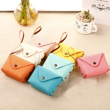 Candy color Coin Purses Creative Macaron Hand bag Mini Coin bag Key case Wallet PU Leather Portable Handbag for children girls
Candy color Coin Purses Creative Macaron Hand bag Mini Coin bag Key case Wallet PU Leather Portable Handbag for children girls