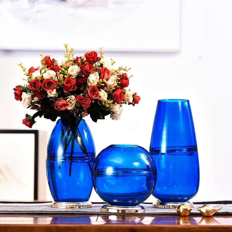 Modern Home Blue Transparent Glass Vase Table Personalized & Creative Glass Modern Water for Flower Arrangement Vase Decoration
Modern Home Blue Transparent Glass Vase Table Personalized & Creative Glass Modern Water for Flower Arrangement Vase Decoration