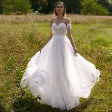 Elegant Tulle Bohemian Wedding Dress For Bride Off Shoulder A Line Simple Civil Bridal Gown Tassel White Свадебное платье 2021
Elegant Tulle Bohemian Wedding Dress For Bride Off Shoulder A Line Simple Civil Bridal Gown Tassel White Свадебное платье 2021