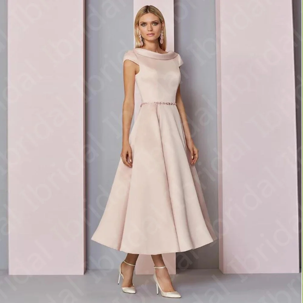 2022 Latest Classic Blush Tea Length Mother of the Bride Dresses O Neckline With Cap Sleeve Wedding Guest Gowns Backless On Sale
2022 Latest Classic Blush Tea Length Mother of the Bride Dresses O Neckline With Cap Sleeve Wedding Guest Gowns Backless On Sale