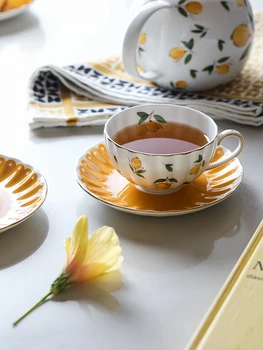 Lemon Bone China household tea flower tea set, 4-person suit, office creative coffee cup and saucer
Lemon Bone China household tea flower tea set, 4-person suit, office creative coffee cup and saucer