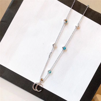 2020 New pairing in spring Greenstone Double Letters Pendant Necklace S925 Sterling silver Women Jewelry Valentine's Day gift 
2020 New pairing in spring Greenstone Double Letters Pendant Necklace S925 Sterling silver Women Jewelry Valentine's Day gift