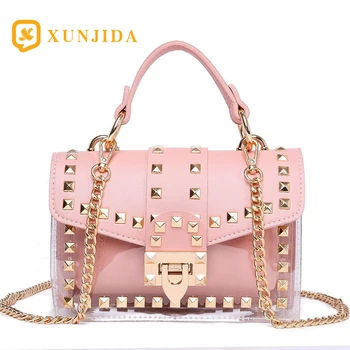 XUNJIDA NEW 2020 Women Shoulder Bag Fashion Rivet Transparent PU Handbag Portable Diagonal Pack Metal Chain Clear Bag Party Bag
XUNJIDA NEW 2020 Women Shoulder Bag Fashion Rivet Transparent PU Handbag Portable Diagonal Pack Metal Chain Clear Bag Party Bag