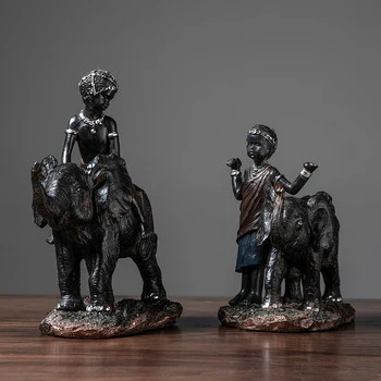 African Little Boy Riding On An Elephant Statues Sculptures Resin Decor Crafts Gifts Figurines Desktop Home Decor Accessories
African Little Boy Riding On An Elephant Statues Sculptures Resin Decor Crafts Gifts Figurines Desktop Home Decor Accessories