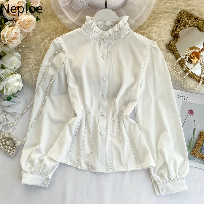 Neploe Women Blouse Autumn 2020 New Stand Neck Nailed Pearl Shirt Feminine Korean Fashion Long Sleeve Elegant Blusas Tops 55631
Neploe Women Blouse Autumn 2020 New Stand Neck Nailed Pearl Shirt Feminine Korean Fashion Long Sleeve Elegant Blusas Tops 55631
