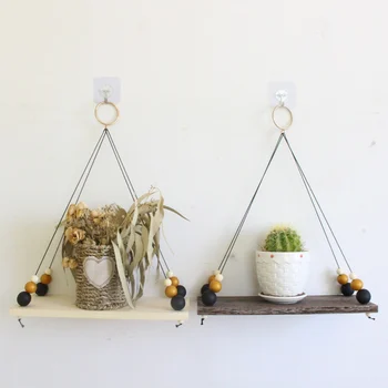 Retro Wooden Decoration Shelf With Wooden Beads Household Wall Hanging Rack For Plant Decoration Hanging Shelf For Wall 
Retro Wooden Decoration Shelf With Wooden Beads Household Wall Hanging Rack For Plant Decoration Hanging Shelf For Wall