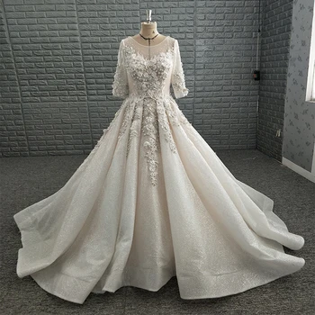 Modest Arabia Short Sleeve Glitter Ball Gown Wedding Dress with Floral Flowers
Modest Arabia Short Sleeve Glitter Ball Gown Wedding Dress with Floral Flowers