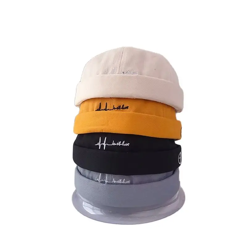 Фото Матросская шапка без козырька с вышивкой Шапка-бини закатанными манжетами