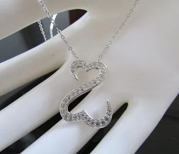 NEW Authentic 925 sterling silver open heart micro pave heart arrow cz silver necklace
NEW Authentic 925 sterling silver open heart micro pave heart arrow cz silver necklace