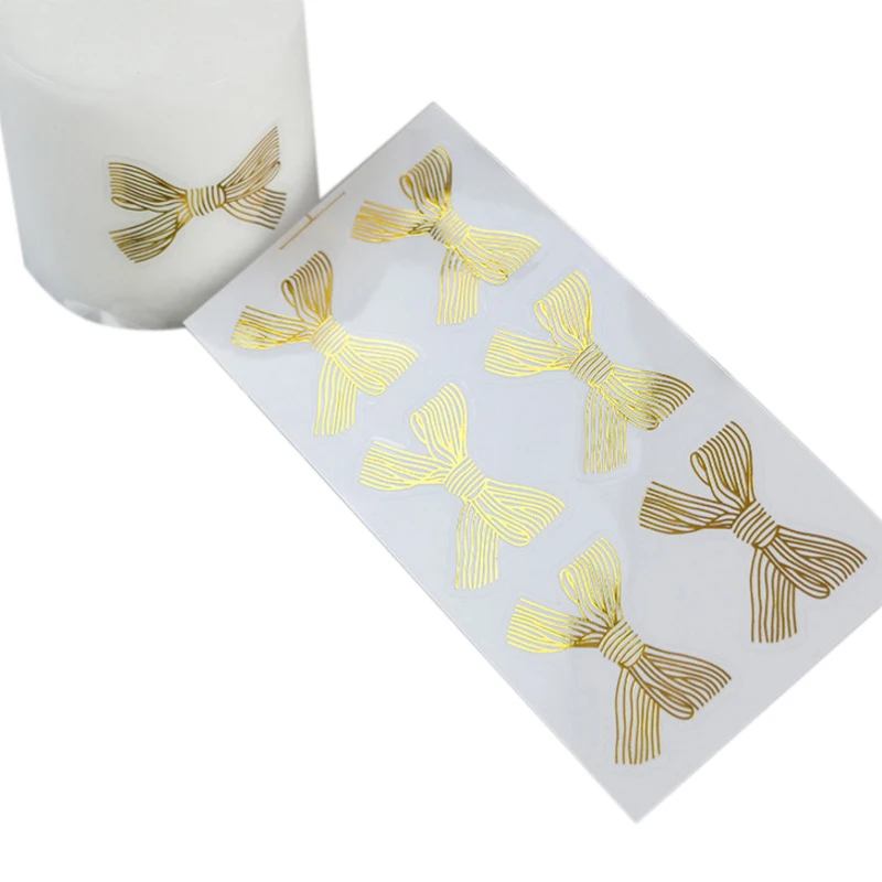60pcs/lot Kawaii Stickers Gold Bow Bronzing Transparent Seal Sticker Gift Packaging Stickers Scrapbooking Sealing foil sticker
60pcs/lot Kawaii Stickers Gold Bow Bronzing Transparent Seal Sticker Gift Packaging Stickers Scrapbooking Sealing foil sticker
