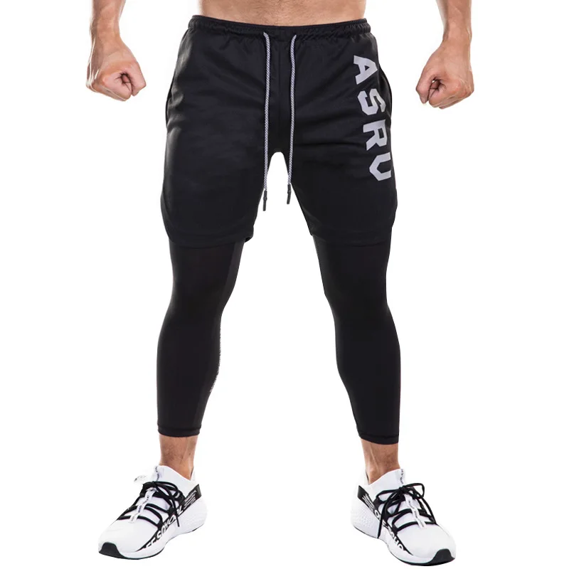 Hot sale Gym Mens Sports Tight Feet Pants Fake 2 Pieces Nine Pants With towel Running Fitness Work Out Short Pants Men Joggers
Hot sale Gym Mens Sports Tight Feet Pants Fake 2 Pieces Nine Pants With towel Running Fitness Work Out Short Pants Men Joggers