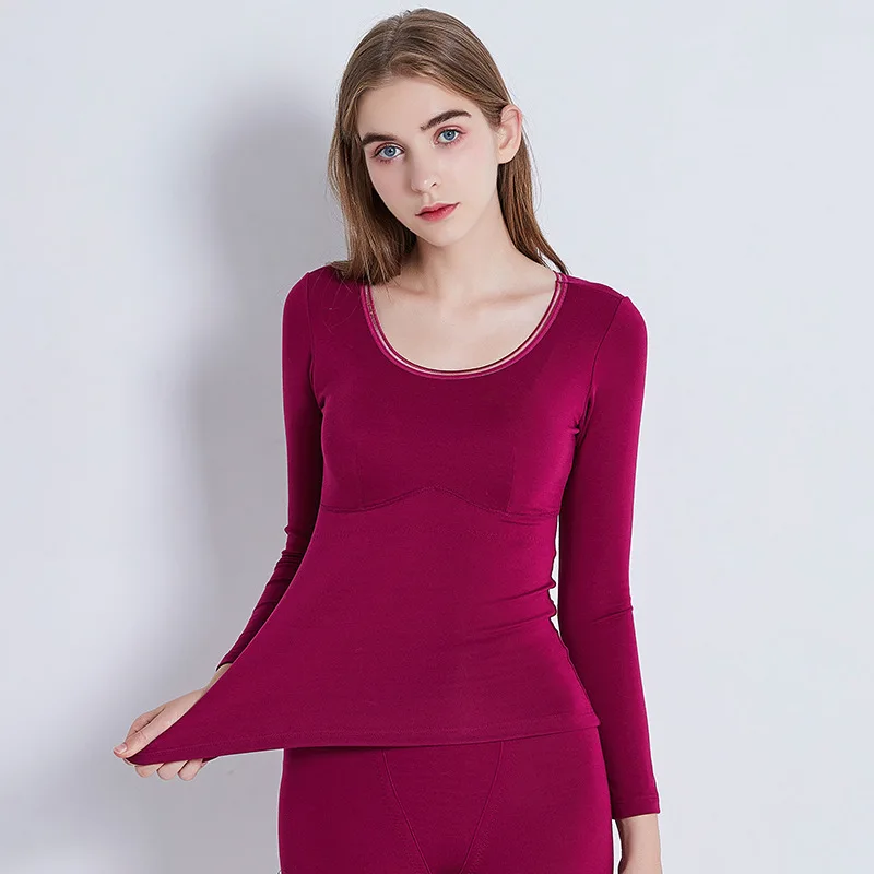 The New Autumn and Winter Warmth with Chest Pad Underwear One-piece Long-sleeved Round Neck Frosted Ladies Bottoming Shirt 2020
The New Autumn and Winter Warmth with Chest Pad Underwear One-piece Long-sleeved Round Neck Frosted Ladies Bottoming Shirt 2020