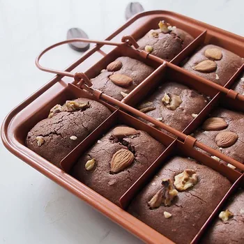 Non-Stick Brownie Pan With Dividers 18 Pre-Slice Brownie Baking Tray Cake Mold For Bread, Brownies, Chocolates Or Cheese Cakes
Non-Stick Brownie Pan With Dividers 18 Pre-Slice Brownie Baking Tray Cake Mold For Bread, Brownies, Chocolates Or Cheese Cakes