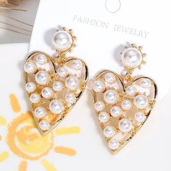 New Brand Statement Korean Pearl Earrings for Women Girls Temperament Love Pearl Earring Fashion Retro Metal Hollow Jewelry Gift
New Brand Statement Korean Pearl Earrings for Women Girls Temperament Love Pearl Earring Fashion Retro Metal Hollow Jewelry Gift