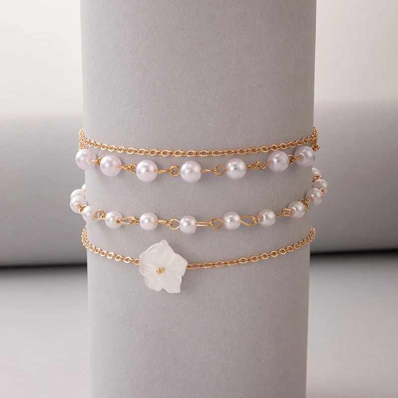 Фото Женский браслет на ногу Tocona красивый с белыми цветами элегантный жемчужный