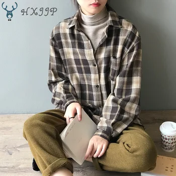 Autumn and winter 2019 new retro lattice loose show thin student shirt women Korean version casual shirt female 8963. 
Autumn and winter 2019 new retro lattice loose show thin student shirt women Korean version casual shirt female 8963.