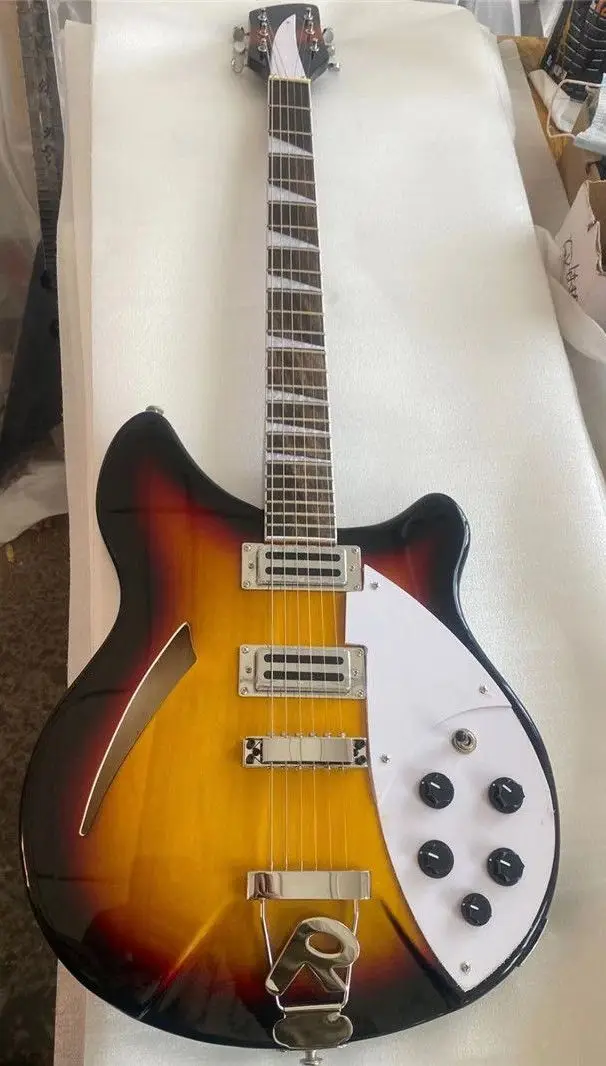 6 string 360 electric guitar, sun color, rosewood fingerboard, half hollow core guitar, free delivery, customized guitar
6 string 360 electric guitar, sun color, rosewood fingerboard, half hollow core guitar, free delivery, customized guitar