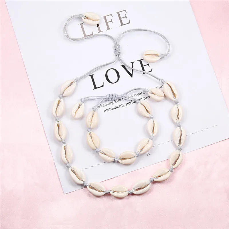 Natural Cowrie Shell Bracelet Necklace Set For Women Handmade Woven Boho Hawaii Beach Shell Adjustable Choker Girl Festival Gift
Natural Cowrie Shell Bracelet Necklace Set For Women Handmade Woven Boho Hawaii Beach Shell Adjustable Choker Girl Festival Gift