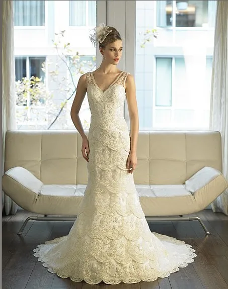 mermaid features layers of corded embroidered lace illusion sleeves deep v-back train bridal gown dress wedding
mermaid features layers of corded embroidered lace illusion sleeves deep v-back train bridal gown dress wedding